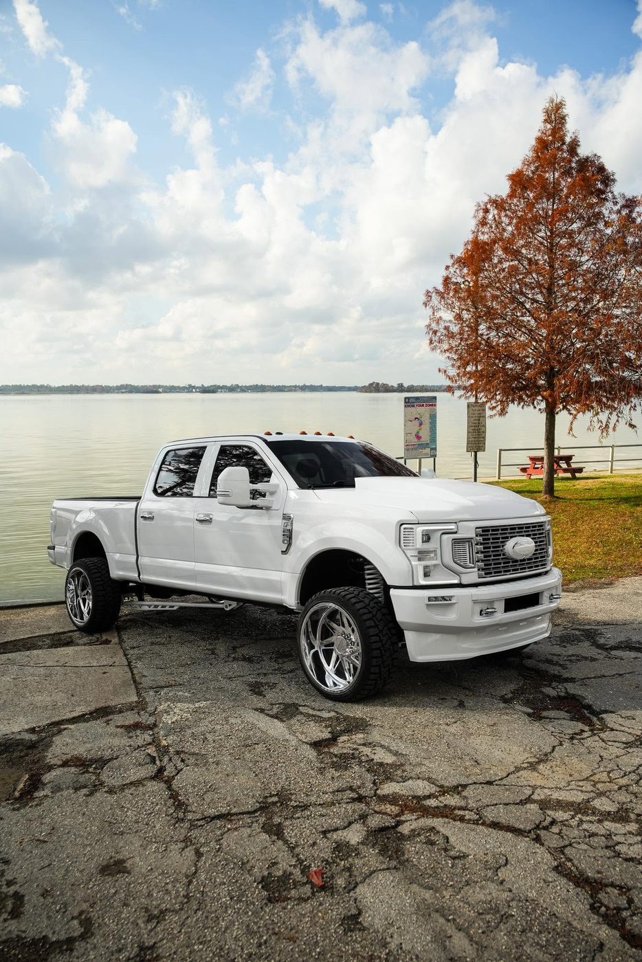 White F-250 Super Duty on forged wheels, built by Unmatched Performance