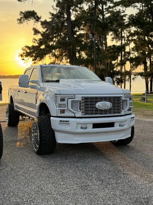 Front three-quarter view of the 2017 Ford F-250 showing the Cervini's hood and paint-matched headlights