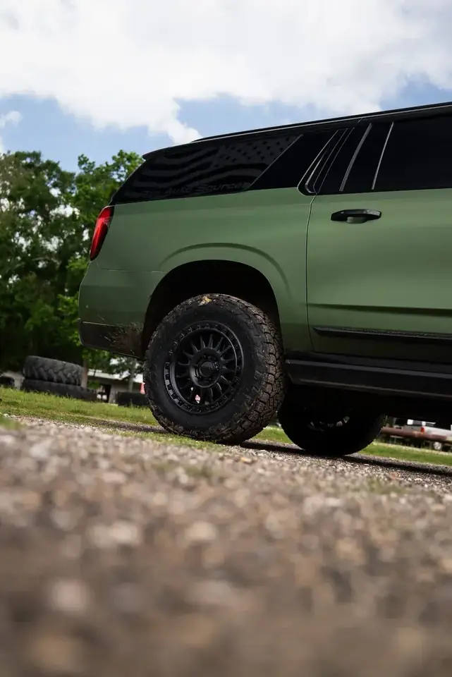 Rear KMC wheel and Nitto tire fitment on 2025 GMC Yukon Elevation