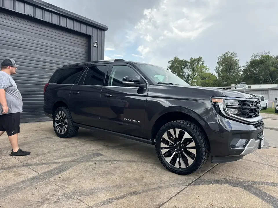 Side view of 2026 Ford Expedition with two-inch lift and all-terrain tires