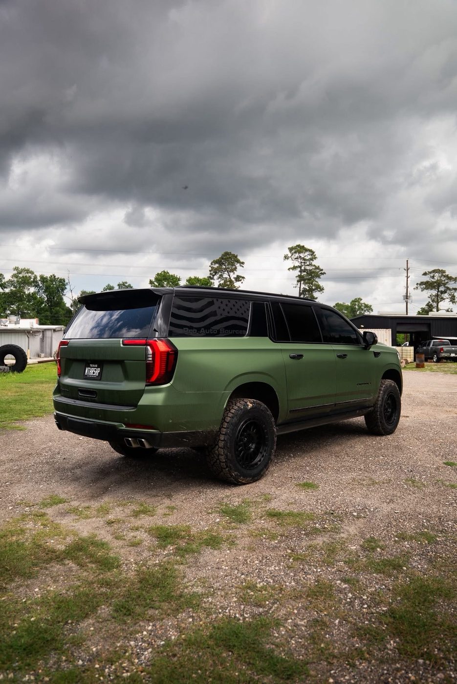 2025 GMC Yukon rear three-quarter